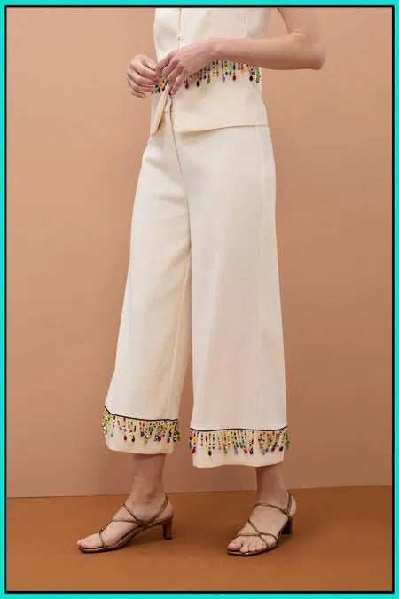 Pantalón midi con piedras